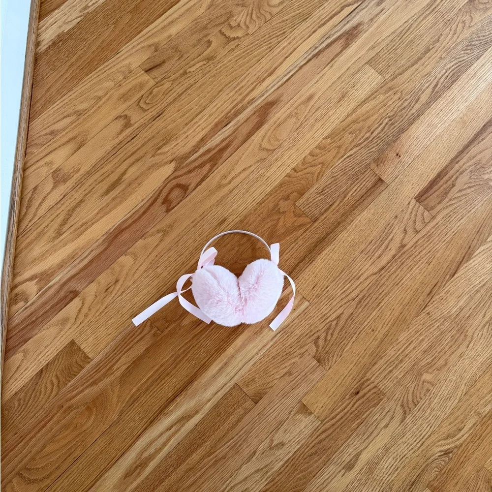 Light pink Pom Pom ear muffs fluffy with bows